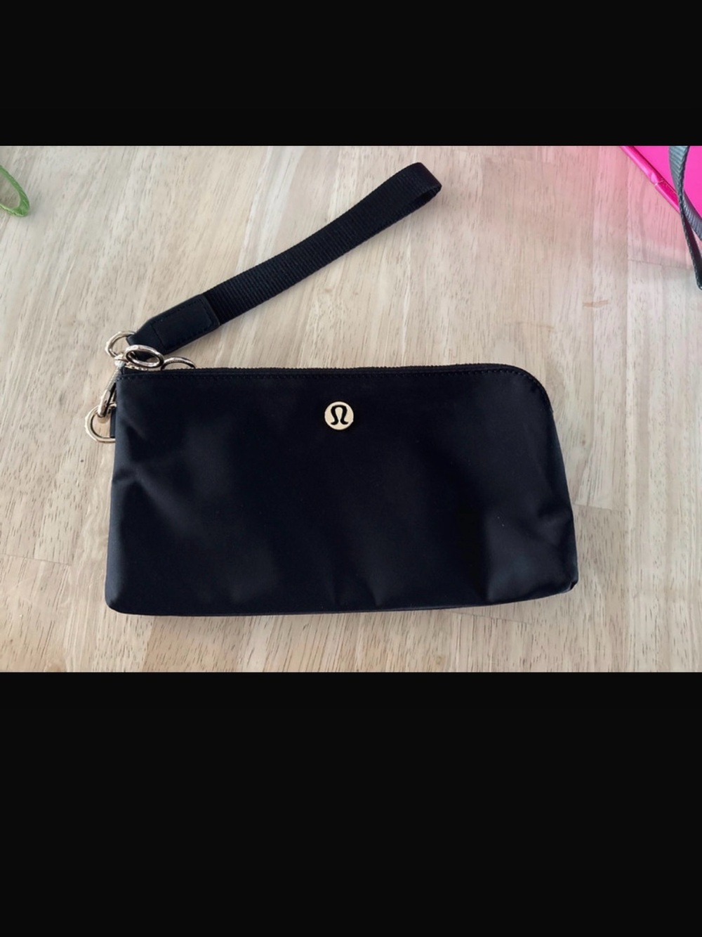 lululemon athletica Black Wristlet Pouch with Gold Logo